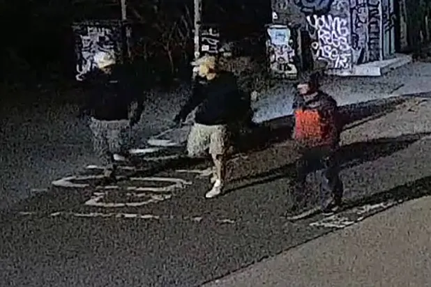 This handout image of CCTV footage released by Avon and Somerset Police on December 11, 2025 shows men in the early hours of September 25 in the city of Bristol, south-west England outside a building which housed items from the Bristol Museum's British Empire and Commonwealth collection. (Photo by Handout / Avon and Somerset Police / AFP)