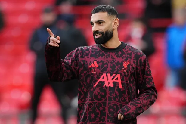 النجم المصري محمد صلاح عاد للمشاركة مع ليفربول (د.ب.أ)