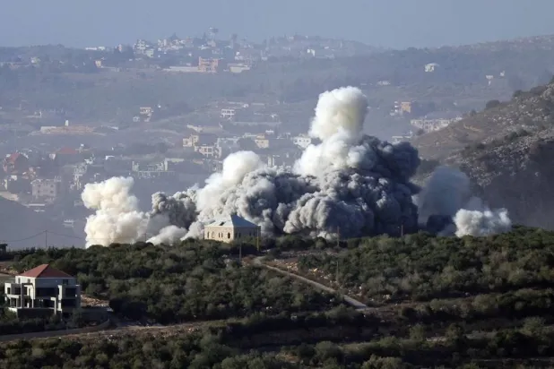 Smoke rises from the site of an Israeli strike that targeted the southern Lebanese, al-Mahmoudiyeh, Lebanon, Nov. 27, 2025. (AFP)