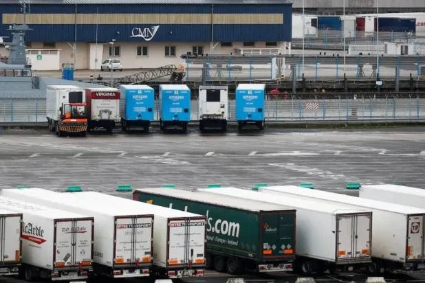 Amazon trailer trucks are seen at Cherbourg Harbor, France January 21, 2021. REUTERS/Gonzalo Fuentes