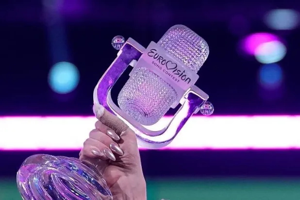 Nemo of Switzerland celebrates holding the trophy after winning the Grand Final of the Eurovision Song Contest in Malmo, Sweden, Sunday, May 12, 2024. (AP)