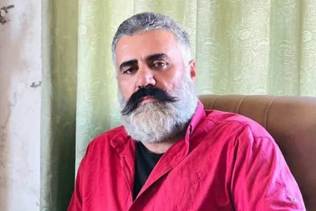 الشاعر والناشط أنور فوزات الشاعر الذي قتل الأحد إثر تعرضه لإطلاق نار من قبل مسلح مجهول أمام منزله في قرية بوسان بريف السويداء الشرقي (وكالة سانا)