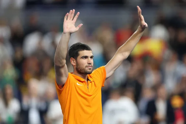 MIAMI, FLORIDA - DECEMBER 08: Carlos Alcaraz of Spain reacts after winning against Joao Fonseca of Brazil during the Miami Invitational at loanDepot park on December 08, 2025 in Miami, Florida. Tomas Diniz Santos/Getty Images/AFP 