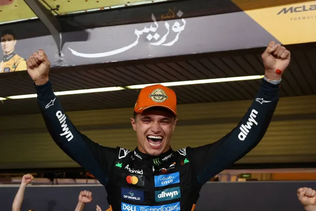 Formula One F1 - Abu Dhabi Grand Prix - Yas Marina Circuit, Abu Dhabi, United Arab Emirates - December 7, 2025 McLaren's Lando Norris celebrates after becoming the 2025 Formula One World Champion (Reuters)