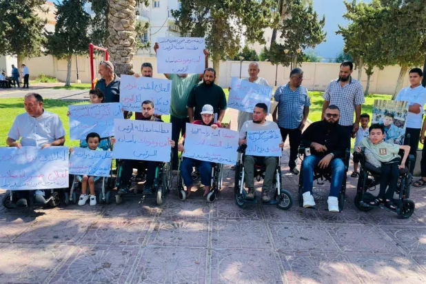 وقفة احتجاجية بالكراسي المتحركة لمرضى ضمور العضلات في طرابلس (رابطة ضمور العضلات)