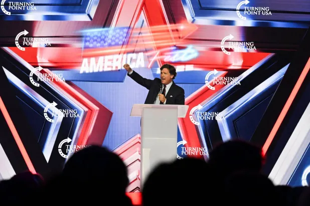 Tucker Carlson speaks during AmericaFest, the first Turning Point USA summit since the death of Charlie Kirk, in Phoenix, Arizona, US December 18, 2025. REUTERS/Caitlin O'Hara

