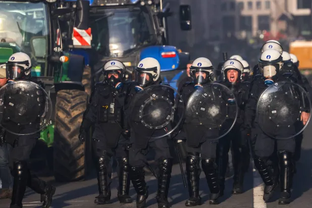 Riot police intervenes during farmers' protest in Brussels, Belgium, 18 December 2025. EPA/OLIVIER MATTHYS
