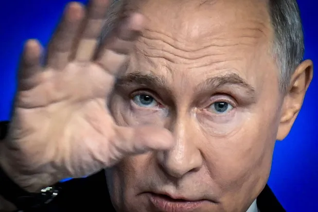 TOPSHOT - Russia's President Vladimir Putin gestures as he speaks during his annual end-of-year press conference, in Moscow, on December 19, 2025.  (Photo by Alexander NEMENOV / AFP)