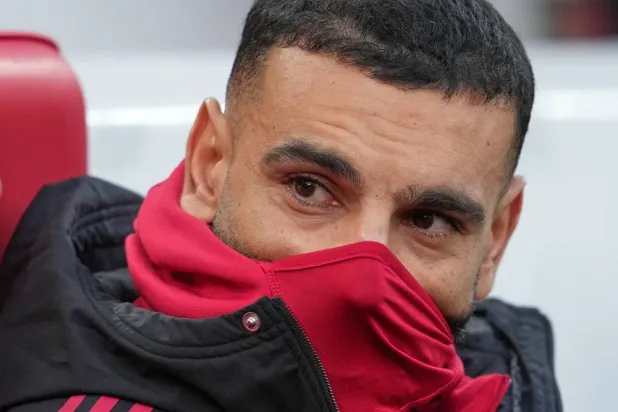 Liverpool's Mohamed Salah sits on the bench before the English Premier League soccer match between Liverpool and Brighton and Hove Albion in Liverpool, England, Saturday, Dec. 13, 2025. (AP) 