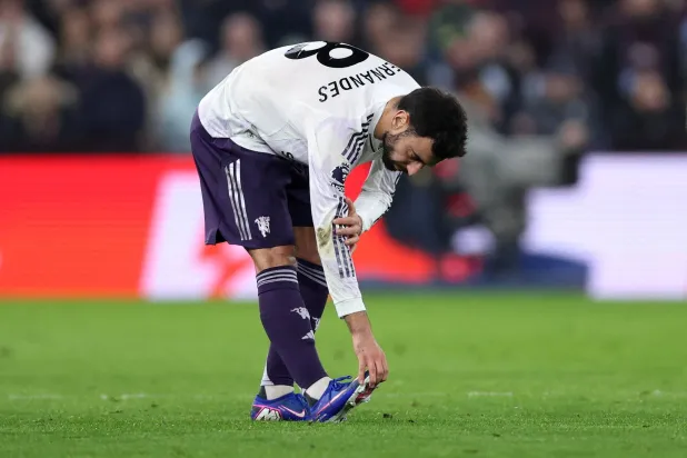 Football - Premier League - Aston Villa v Manchester United - Villa Park, Birmingham, Britain - December 21, 2025 Manchester United's Bruno Fernandes reacts after sustaining an injury. (Reuters)