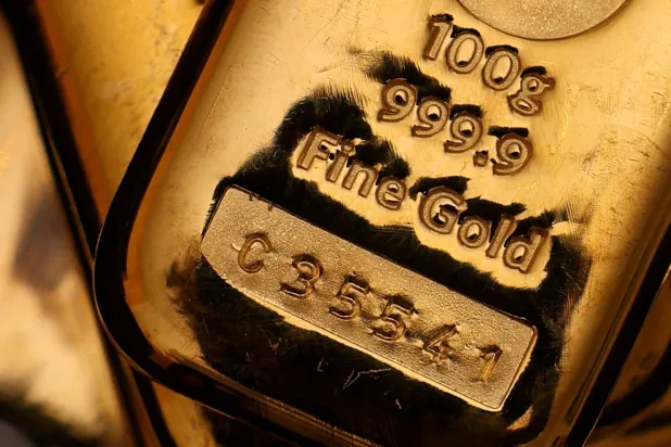 FILE PHOTO: UK gold bullion bars are stacked at Baird & Co in Hatton Garden in London, Britain, October 8, 2025. REUTERS/Hiba Kola/File Photo
