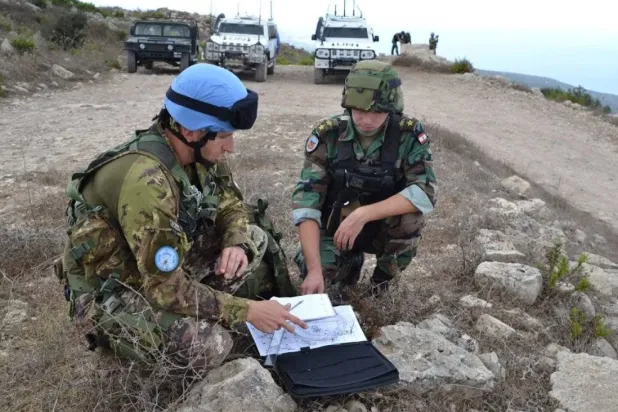A Lebanese army officer and an Italian officer from the UNIFIL force during a joint mission in southern Lebanon (UNIFIL)