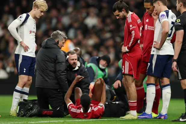 FILE PHOTO: Soccer Football - Premier League - Tottenham Hotspur v Liverpool - Tottenham Hotspur Stadium, London, Britain - December 20, 2025 Liverpool's Alexander Isak receives medical attention due to an injury after scoring their first goal Action Images via Reuters/John Sibley 