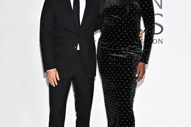 نجمة التنس الأميركية فينوس ويليامز وزوجها أندريا بريتي (أ.ب)