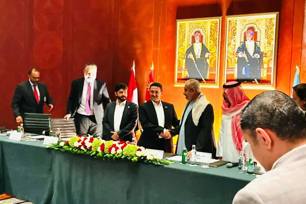 Officials are seen at the announcement of the prisoner exchange agreement in Muscat on Tuesday. (Saudi Ambassador to Yemen on X)