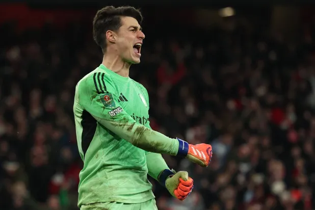Arsenal's Spanish goalkeeper #13 Kepa Arrizabalaga celebrates saving the penalty of Crystal Palace's French defender #05 Maxence Lacroix to win the English League Cup quarter-final football match between Arsenal and Crystal Palace at the Emirates Stadium, in London on December 23, 2025. (AFP)