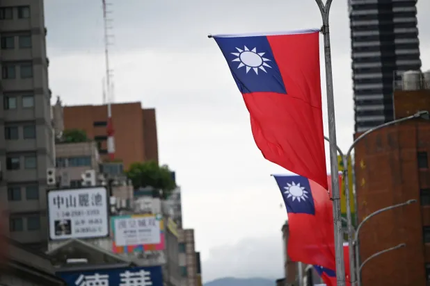 19 May 2024, Taiwan, Taipei: Taiwanese flags fly on a main road. (dpa)