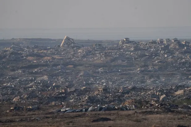 Buildings destroyed during Israeli ground and air operations stand in the Gaza Strip, as seen from southern Israel, Thursday, Dec. 18, 2025. (AP)