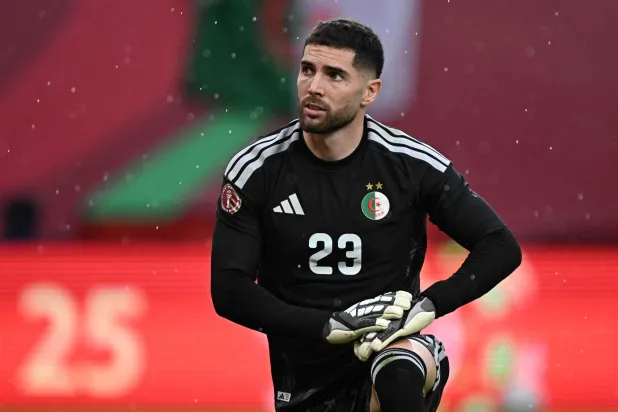  Algeria's goalkeeper #23 Luca Zidane reacts during the Africa Cup of Nations (CAN) Group E football match between Algeria and Sudan at Moulay Hassan Stadium in Rabat on December 24, 2025. (AFP) 