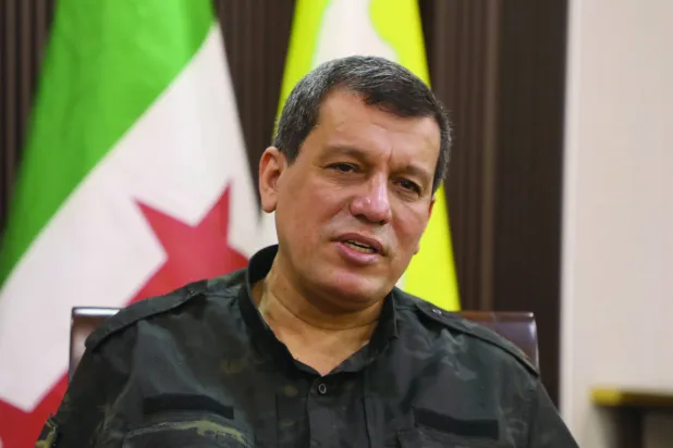 Mazloum Abdi, commander of the Kurdish-led and US-backed Syrian Democratic Forces speaks during an interview with the Associated Press, in the northeastern city of Hassakeh, Syria, Thursday, Oct. 16, 2025. (AP Photo/Hogir Al Abdo)