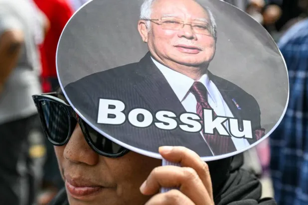 Jailed former Malaysian leader Najib Razak moved closer to serving the rest of his sentence at home after an appeal court ruled he could use a royal decree supporting his claim. Mohd RASFAN / AFP
