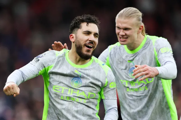  27 December 2025, United Kingdom, Nottingham: Manchester City's Rayan Cherki (L) celebrates scoring his side's second goal with teammate Erling Haaland during the English Premier League soccer match between Nottingham Forest and Manchester City at the City Ground. (Barrington Coombs/PA Wire/dpa_