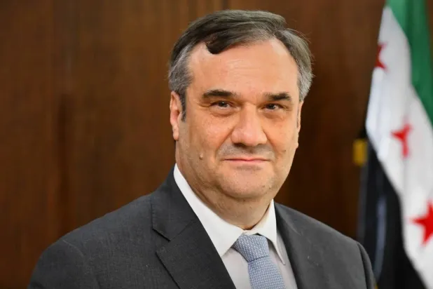 Syrian Central Bank Governor Abdulkader Husrieh (X)