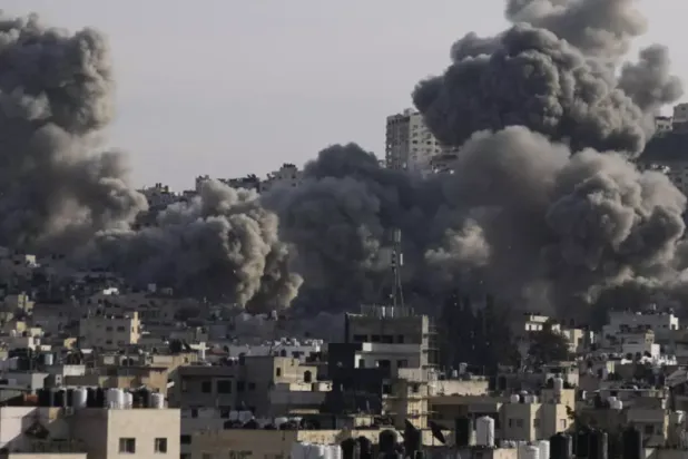 Smoke rises following an explosion detonated by the Israeli army, which said it was destroying buildings used by Palestinian militants in the West Bank Jenin refugee camp, Sunday, February 2, 2025. © Majdi Mohammed, AP
