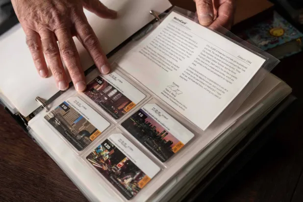 Lev Radin, a MetroCard collector, shows his collection of Inaugural Limited Edition MetroCards, Dec. 10, 2025, in New York. (AP Photo/Yuki Iwamura)