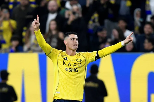 Football - Saudi Pro League - Al-Nassr v Al-Okhdood - Al-Awwal Park, Riyadh, Saudi Arabia - December 27, 2025 Al-Nassr's Cristiano Ronaldo celebrates scoring their third goal before it is disallowed after a VAR review. (Reuters)