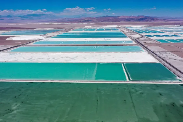 Aerial view of brine ponds and processing areas of the lithium mine of the Chilean company SQM (Sociedad Quimica Minera) in the Atacama Desert, Calama, Chile, on September 12, 2022. (AFP)