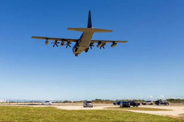 A US Air Force C-130J Super Hercules aircraft approaches for landing at Rafael Hernandez Airport, amid tensions between US President Donald Trump's administration and the government of Venezuelan President Nicolas Maduro, in Aguadilla, Puerto Rico, December 28, 2025. (Reuters) 