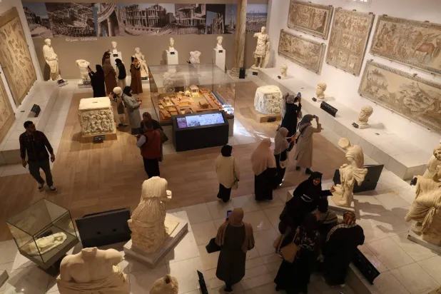 Libyans visit the National Museum after its reopening, following a closure of more than a decade in the Libyan capital Tripoli on December 23, 2025. (AFP)