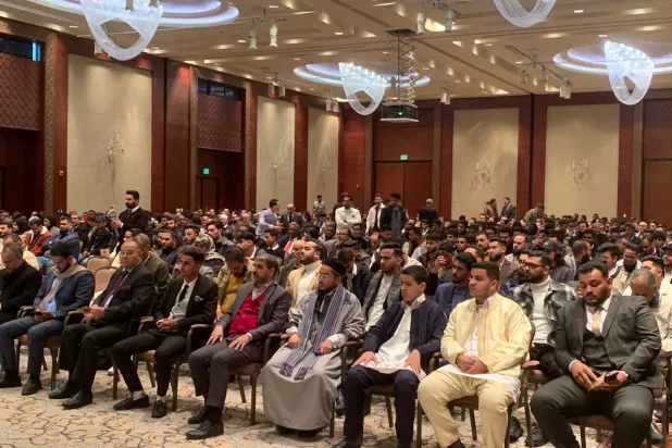 Trablus'taki NFUP toplantısına katılan gençler