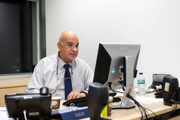 The late Mohammed al-Shafei in his office. (Asharq Al-Awsat) 
