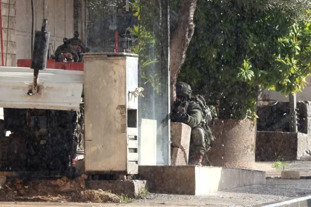 Israeli troops during a military operation in the Palestinian village of Qabatiya, near the West Bank city of Jenin, 27 December 2025. (EPA)