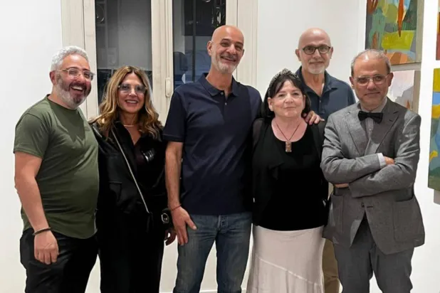 مجموعة من الفنانين المشاركين في المعرض (غاليري آرت أون 56)