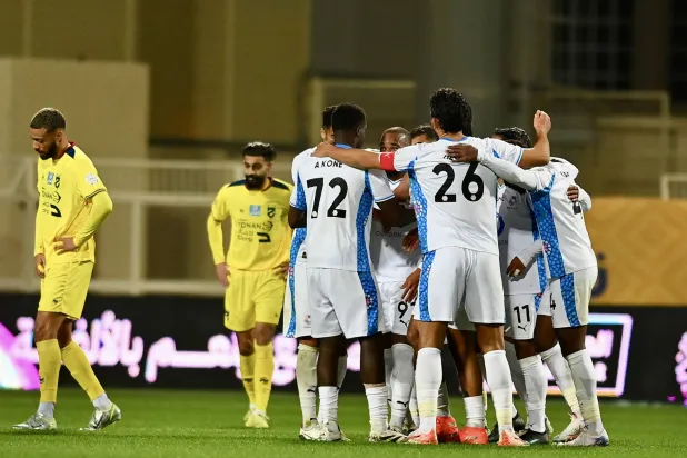 فرحة لاعبي نيوم بالهدف الثاني (تصوير: عبد العزيز النومان)