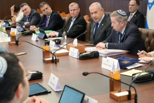 Israeli Prime Minister Benjamin Netanyahu heads the weekly cabinet meeting on Sunday