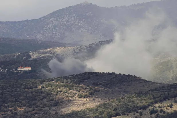 Smoke billows after Israeli warplanes targeted the Rihan Heights in the southern Lebanese district of Jezzine, on January 2, 2026. (AFP) 