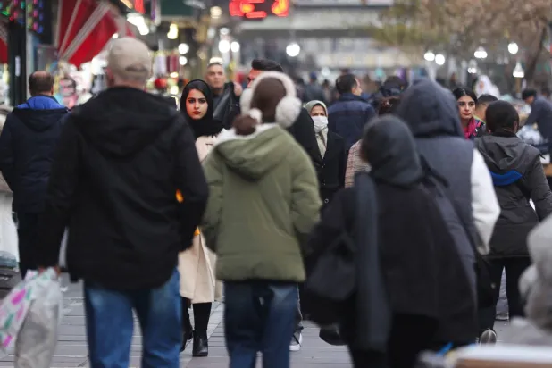  People walk on a street as protests erupt over the collapse of the currency's value in Tehran, Iran, January 2, 2026. Majid Asgaripour/WANA (West Asia News Agency) via Reuters