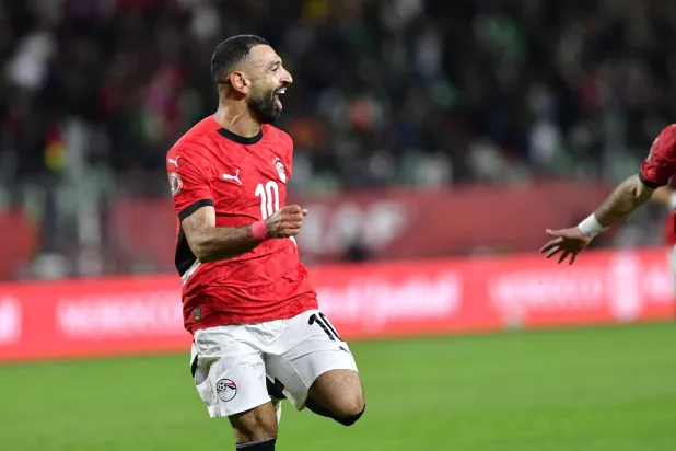Egypt's Mohamed Salah celebrates after scoring the 3-1 goal during the CAF Africa Cup of Nations 2025, Round of 16 match between Egypt and Benin in Agadir, Morocco, 05 January 2026. EPA/JALAL MORCHIDI