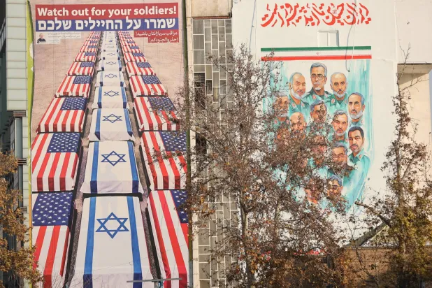 An anti-US and anti-Israeli billboard is displayed on a building in Tehran, Iran, January 4, 2026. Majid Asgaripour/WANA (West Asia News Agency) via Reuters