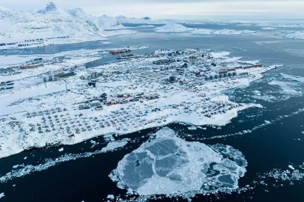 Houses covered by snow are seen on the coast of a sea inlet of Nuuk, Greenland, on March 7, 2025. (AP Photo/Evgeniy Maloletka, File) 