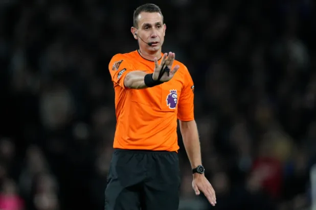 Referee David Coote reacts during the English Premier League soccer match between Tottenham Hotspur and Brighton and Brentford, at White Hart Lane Stadium in London, England, Wednesday, Jan. 31, 2024. (AP Photo/Dave Shopland, File)

