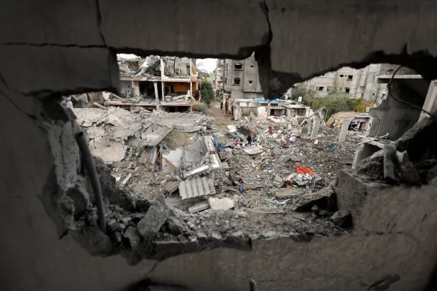 Rubble lies at the site of Thursday's Israeli strike on a house, in the central Gaza Strip, January 9, 2026. (Reuters)