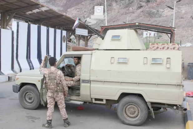 Soldiers are seen outside the headquarters of the Southern Transitional Council in Aden, Yemen. (Reuters)