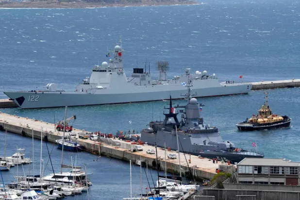  The Chinese guided-missile destroyer Tangshan, left, and the Russian corvette Stoikiy, right, in the Simon's Town harbor, in Cape Town, South Africa, Friday, Jan. 9, 2026. (AP) 