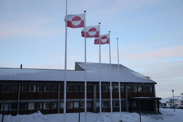05 February 2025, Greenland, Nuuk: Greenlandic flags fly in front of the Inatsisartut parliament in the capital Nuuk. (dpa)