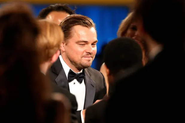 Leonardo DiCaprio takes the stage to accept the award for Outstanding Performance by a Male Actor in a Leading Role for his role in "The Revenant" at the 22nd Screen Actors Guild Awards in Los Angeles, California January 30, 2016.(Reuters)